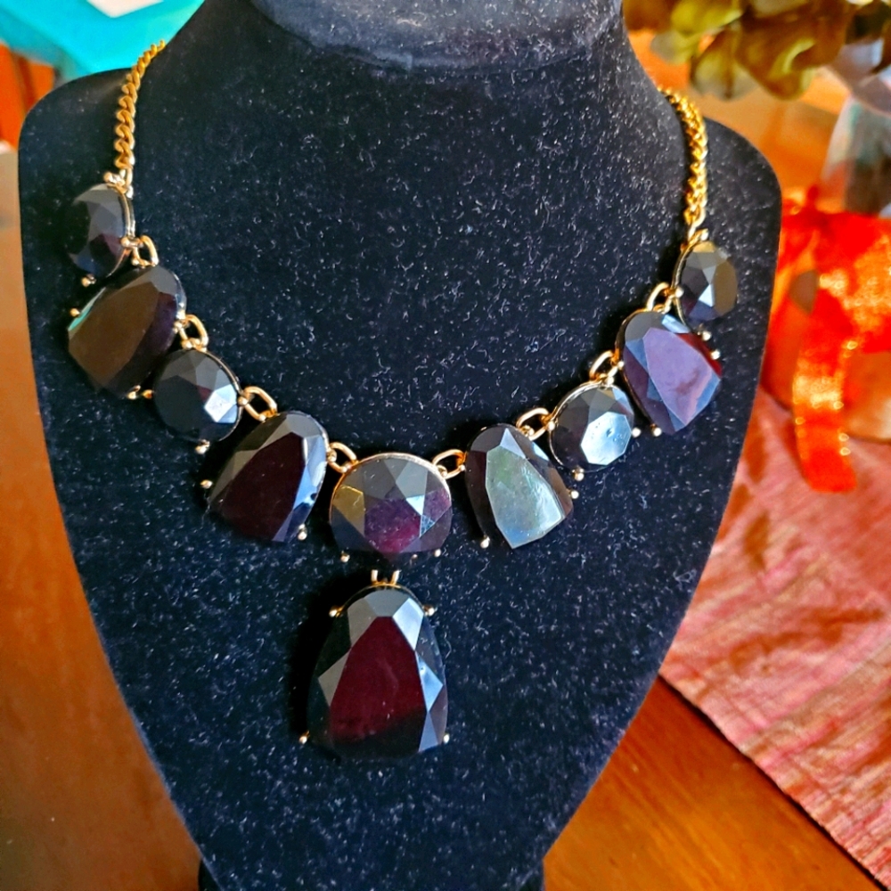 Compass goldtone with black onyx look plastic "stones" necklace